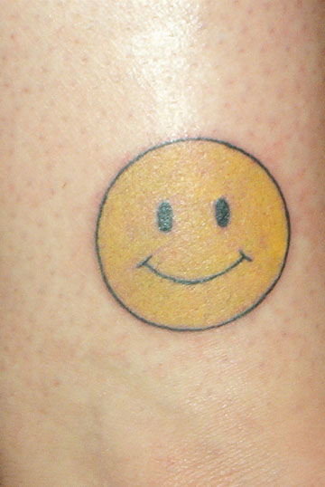 Smiley Face Tattoos.